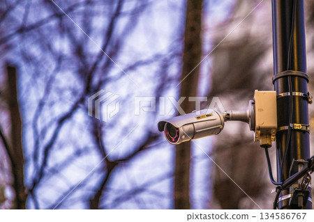 Yokohama cityscape in Japan. Flashing security cameras on street corners. Tomorrow is the winter solstice, the shortest day of the year. It gets dark early. 134586767