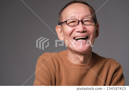 Laughing grandpa 134587423