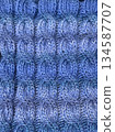 Blue knitted background 134587707