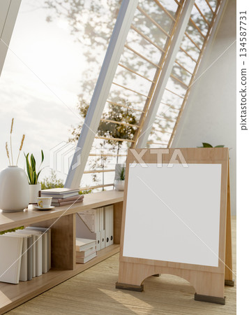 Blank signboard on wooden floor with bookshelf and sloped roof windows in a bright sunlit attic room Blank signboard on wooden floor with bookshelf and sloped roof windows in a bright sunlit attic room 134587731
