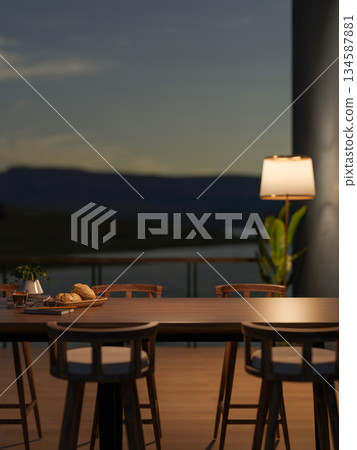 Coffee with bread and book on wooden dining table and chair across balcony in dim cafe or restaurant 134587881