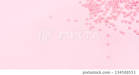 Pink background with tiny hearts. Valentine's day concept. Top view. Pink background with tiny hearts. Valentine's day concept. Top view. 134588551