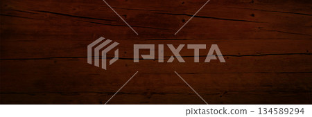 Dark brown wooden texture with grain pattern Dark brown wooden texture with grain pattern 134589294