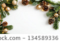 Festive Christmas background with pine branches, golden ornaments, and pine cones for holiday decor 134589336