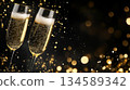 Sparkling champagne flutes with festive bokeh background for holiday celebration concept 134589342