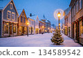 Snowy night Christmas street 134589542