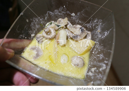 Potatoes and mushrooms in a pan with cream - tasty healthy vegetarian eating Potatoes and mushrooms in a pan with cream - tasty healthy vegetarian eating 134589906