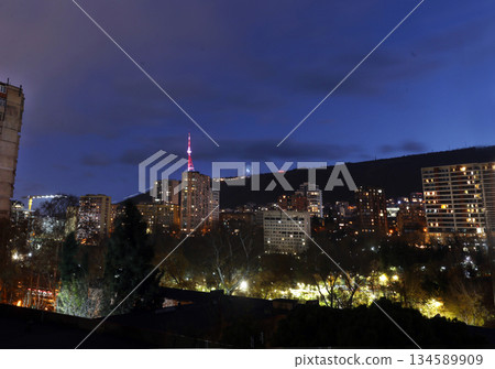 Vake district of Tbilisi and hill and TV tower and ferris wheel Vake district of Tbilisi and hill and TV tower and ferris wheel 134589909