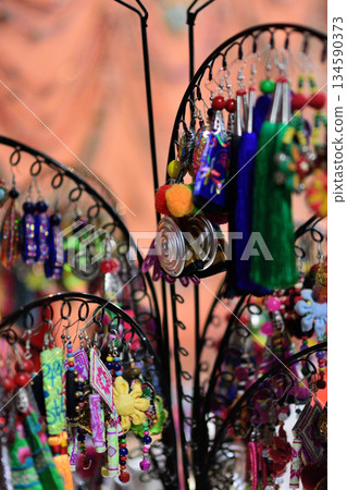 Colorful Handmade Earrings on Display 134590373