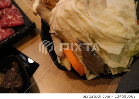 Shrimp and vegetable hot pot ingredients Shrimp and vegetable hot pot ingredients 134590562