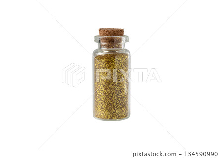 Small glass bottle with gold glitter and cork stopper isolated on white 134590990