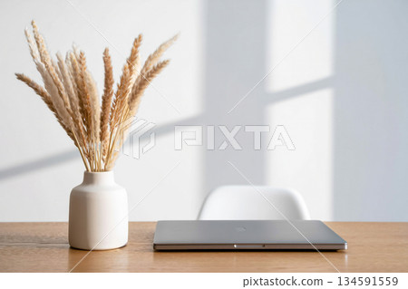 close up of a laptop, coffee and ears close up of a laptop, coffee and ears 134591559