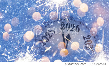 Countdown to midnight. Retro style clock counting last moments before Christmas or New Year 2026. Vintage. Vintage watch points to New Year 2026 in snow 134592581