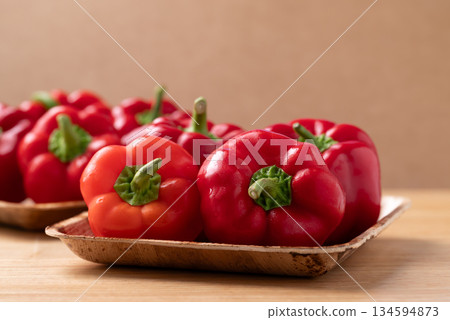 Red bell pepper or sweet pepper on wooden background Red bell pepper or sweet pepper on wooden background 134594873