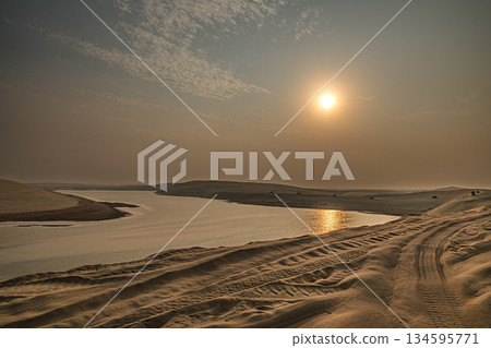 The Mesaieed Desert meets the sea in Doha, Qatar. 134595771