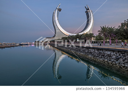 Katara Towers , Lusail, Qatar Opened in 2022, this iconic structure is designed in the shape of a crescent, one of Qatar's cultural symbols. 134595966