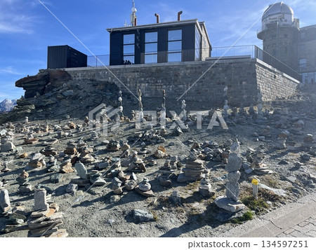 Stone cairns at the Gornergrat observation deck in Switzerland Stone cairns at the Gornergrat observation deck in Switzerland 134597251