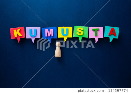 Wooden doll connecting with kumusta filipino language speech 134597774