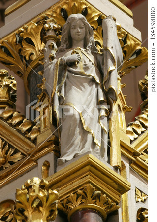 Angel, statue on the main altar in Zagreb cathedral Angel, statue on the main altar in Zagreb cathedral 134598080