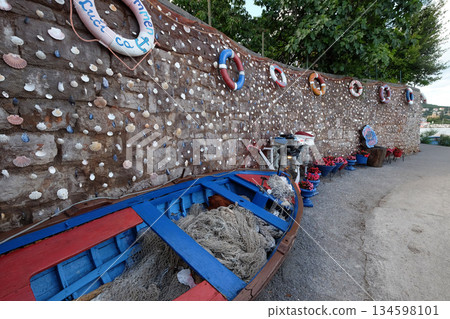 Old fishing equipment, exposed as decoration in front of the restaurant in Icici, Croatia Old fishing equipment, exposed as decoration in front of the restaurant in Icici, Croatia 134598101
