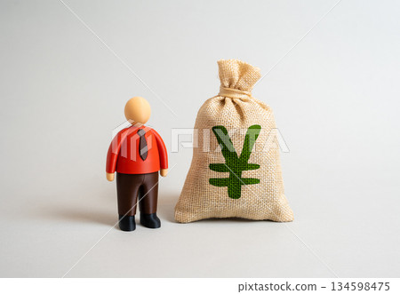 Yen or yuan money bag and office worker. Prosperity of working individuals. Savings and income stability. Expenses for employee retraining and training. Financial independence, wage growth. Yen or yuan money bag and office worker. Prosperity of working individuals. Savings and income stability. Expenses for employee retraining and training. Financial independence, wage growth. 134598475