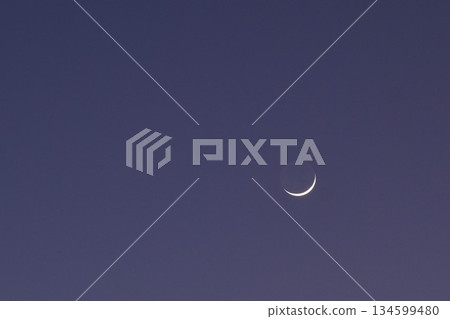 half moon floating on blue sky in twilight background  134599480