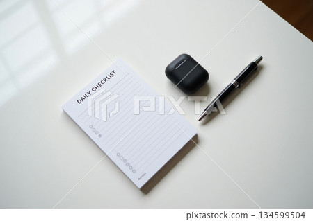 personal organizer or planner with fountain pen 134599504
