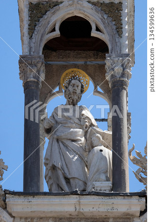 Saint Matthew the Evangelist, marble statue, detail of the facade of the Saint Mark's Basilica, St. Mark's Square, Venice, Italy Saint Matthew the Evangelist, marble statue, detail of the facade of the Saint Mark's Basilica, St. Mark's Square, Venice, Italy 134599636