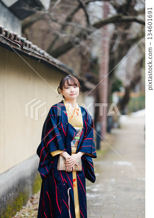 A woman in a kimono A woman in a kimono 134601691
