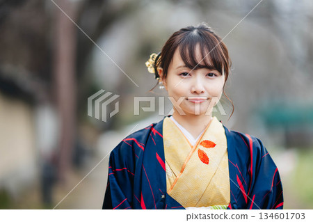 A woman in a kimono 134601703