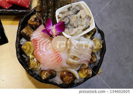 Raw fish and shellfish seafood platter Raw fish and shellfish seafood platter 134602605