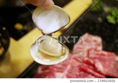 Clams that open naturally after cooking Clams that open naturally after cooking 134602606