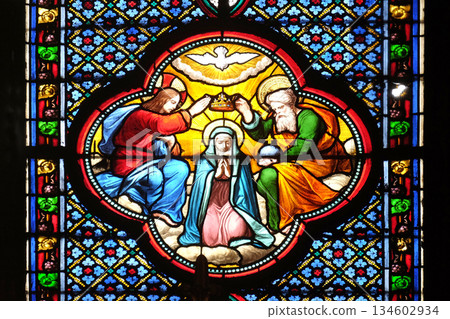 Crowning of the Virgin Mary, stained glass window in the Basilica of Saint Clotilde in Paris, France 134602934