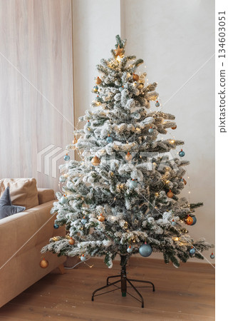 Decorated Christmas Tree into Cozy Living Room Decorated Christmas Tree into Cozy Living Room 134603051