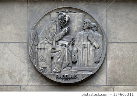 Francois Rabelais, French Renaissance writer, physician, Renaissance humanist, monk and Greek scholar. Stone relief at the building of the Faculte de Medecine Paris, France. Francois Rabelais, French Renaissance writer, physician, Renaissance humanist, monk and Greek scholar. Stone relief at the building of the Faculte de Medecine Paris, France. 134603311