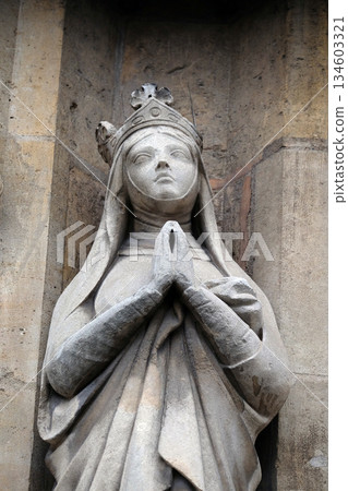 Saint Radegund statue on the portal of the Saint Germain l'Auxerrois church in Paris, France 134603321