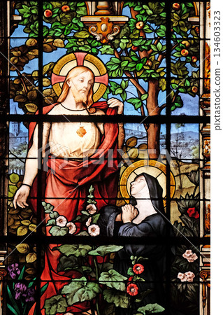 Apparition of the Sacred Heart to Marguerite Marie Alacoque, stained glass windows in the Saint Gervais and Saint Protais Church, Paris, France Apparition of the Sacred Heart to Marguerite Marie Alacoque, stained glass windows in the Saint Gervais and Saint Protais Church, Paris, France 134603323