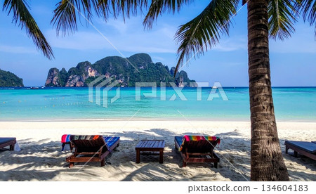 empty hammock on tropical beach 134604183