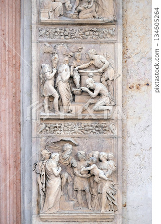 Stories of Rebecca up and Moses by Alfonso Lombardi, left door of San Petronio Basilica in Bologna, Italy 134605264