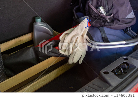 Car trunk with road trip safety essentials 134605381