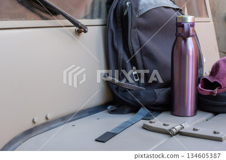 Backpack and travel gear getting ready for an off-road adventure Backpack and travel gear getting ready for an off-road adventure 134605387