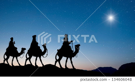 Three Wise Men on their way to meet Christ. Horizontal shot with space for text 134606048