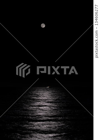 Ships and the sea illuminated by the harvest moon 134606277