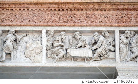 Supper at Emmaus by Zaccaria da Volterra, door of San Petronio Basilica in Bologna, Italy Supper at Emmaus by Zaccaria da Volterra, door of San Petronio Basilica in Bologna, Italy 134606383