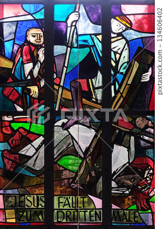 9th Stations of the Cross, Jesus falls the third time, stained glass window in Saint Lawrence church in Kleinostheim, Germany 134606402