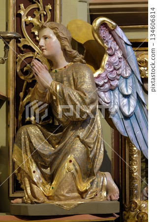 Angel statue on the altar in the church of Saint Matthew in Stitar, Croatia Angel statue on the altar in the church of Saint Matthew in Stitar, Croatia 134606814