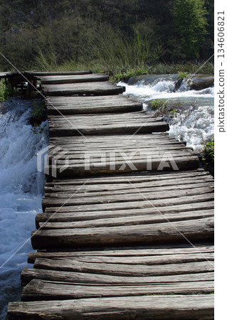 Wooden pathway in Plitvice Lakes national park in Croatia Wooden pathway in Plitvice Lakes national park in Croatia 134606821