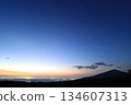 Orion and the pre-dawn scenery seen from a high mountain 134607313
