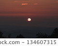A dazzling sunrise seen from the mountains 134607315