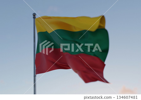 Lithuania national flag waving in the wind against a clear blue sky, symbolizing freedom, heritage, and pride. Patriotic concept. Travel, creative idea. Politics and Ethnicity 134607481